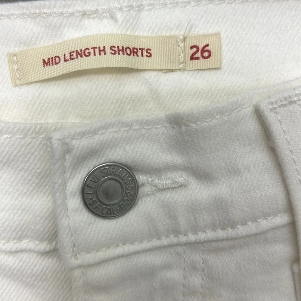 62. Levi distressed Mid Length white Jean shorts,Sz 26, cuffed bottoms, EUC - Picture 3 of 11